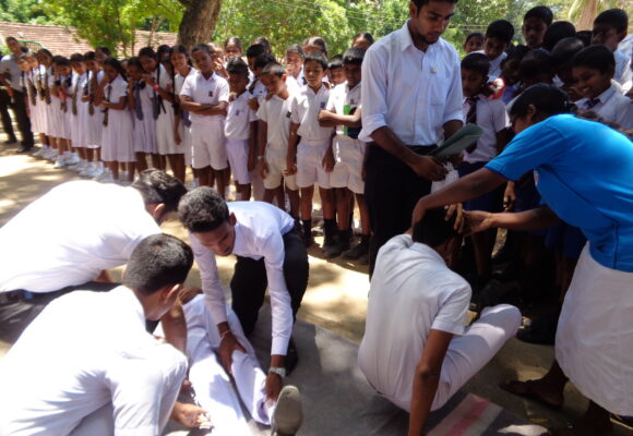 Educating children on first aid in various parts of Sri Lanka